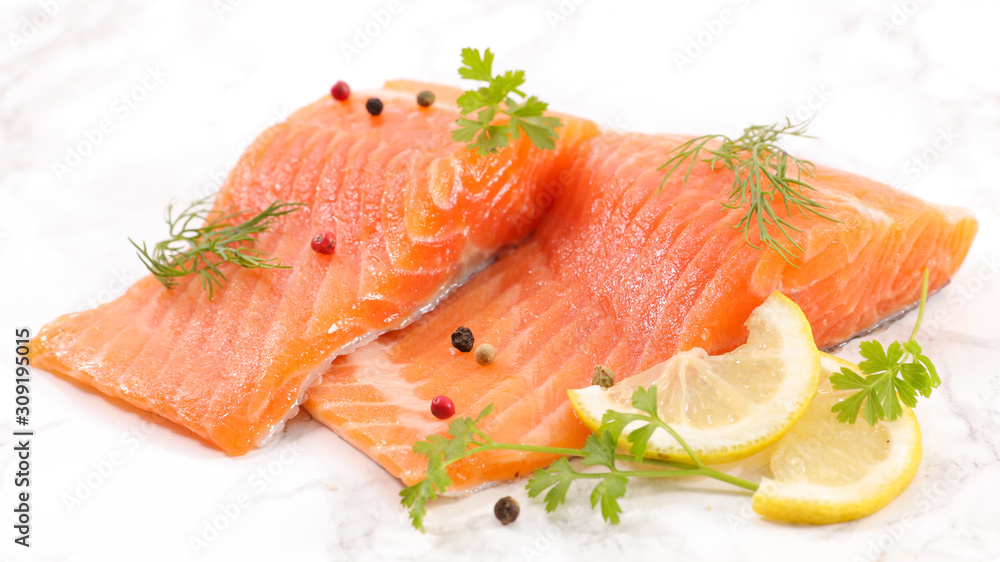 raw fish, salmon fillet with dill and lemon