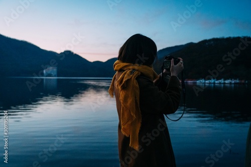 Wallpaper Mural woman looking through binoculars Torontodigital.ca