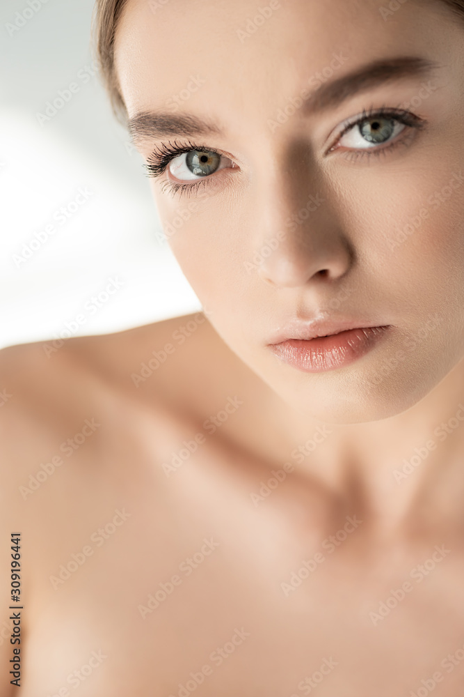 beautiful naked girl looking at camera on white beautiful naked girl looking at camera on white
