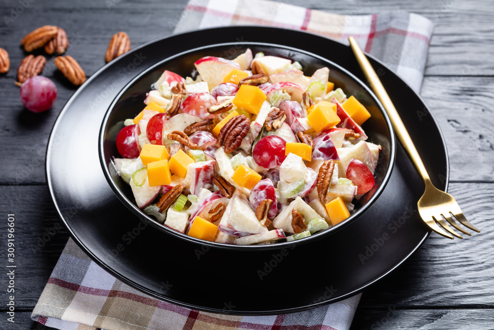 tasty apple salad with pecan nuts, close-up tasty apple salad with pecan nuts, close-up