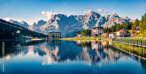 Fototapeta Naklejka Na Ścianę i Meble -  Panoramic morning view of Misurina village, National Park Tre Cime di Lavaredo, Location Auronzo, Dolomiti Alps, South Tyrol, Italy, Europe. Colorful summer scene of Misurina lake.