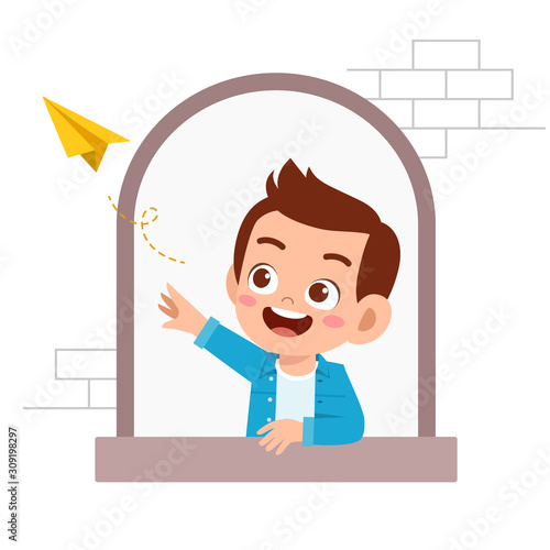 happy cute kid boy expression on window