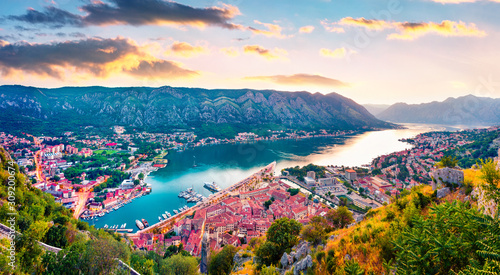 By the Old Town way to Saint John chapel there is a magnificent panorama of Kotor Bay and the city of the same name - Kotor  Montenegro. Fantastic summer sunset in Kotor port.