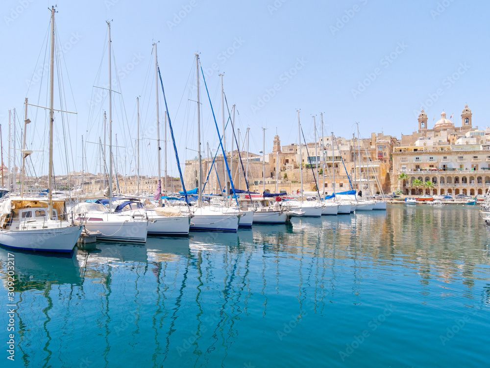 Beautiful ships and the port of Isla. Malta