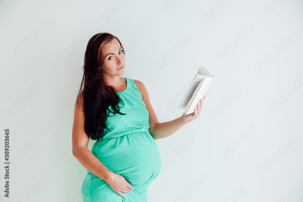 pregnant woman reading a book before childbirth pregnant woman reading a book before childbirth