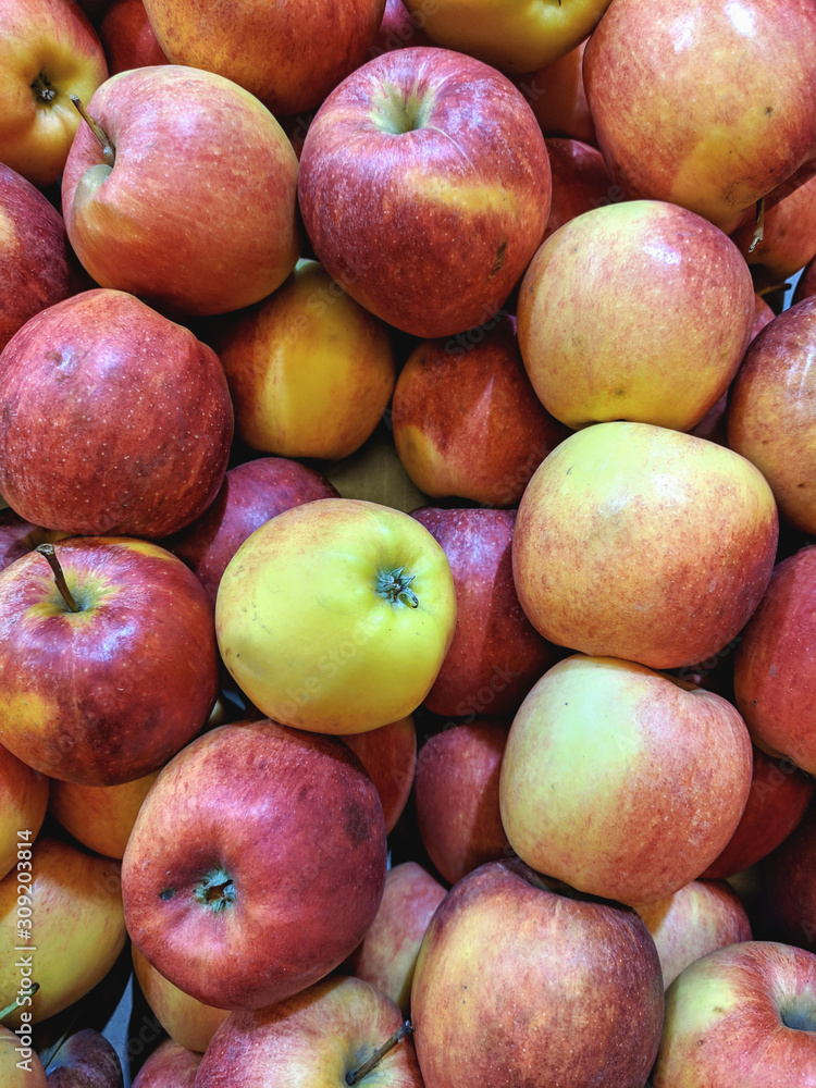 Juicy Organic Apples on a counter in a store. Juicy Organic Apples on a counter in a store.