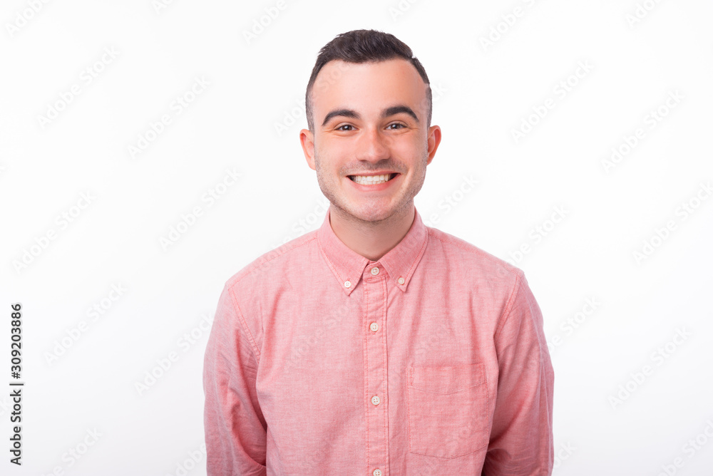 Close up portrait of happy smiling man looking at the camera Close up portrait of happy smiling man looking at the camera