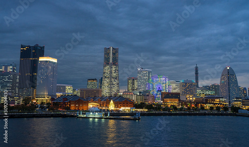 Yokohama  Japan city skyline from the bay at twilight.