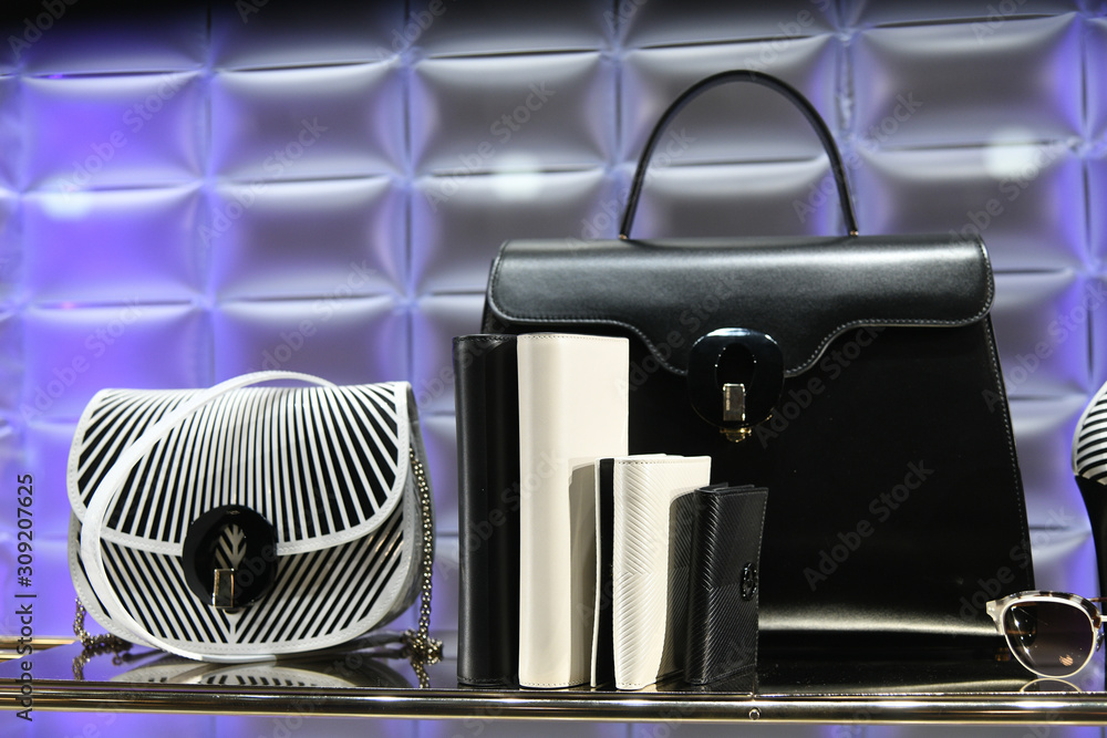 Milan, Italy – February 22, 2019: Mixed Giorgio Armani accessories in a  luxury store in Milan, February 2019. Stock Photo | Adobe Stock