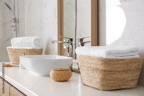 Konstfotografi Large mirror and vessel sink in bathroom