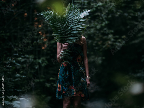 Young woman wearing dresses...