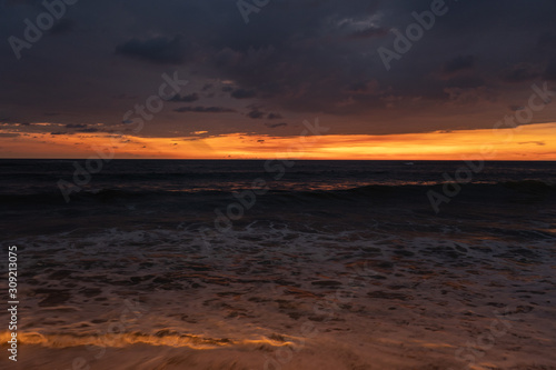 Beautiful sunset on the shore of the Indian Ocean