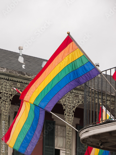Rainbow gay pride flag in the middle of the french quarter in New Orleans, USA.