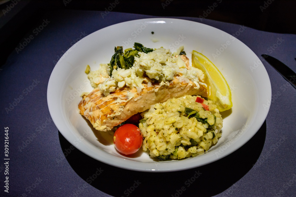 Plate with grilled salmon and risoto Plate with grilled salmon and risoto