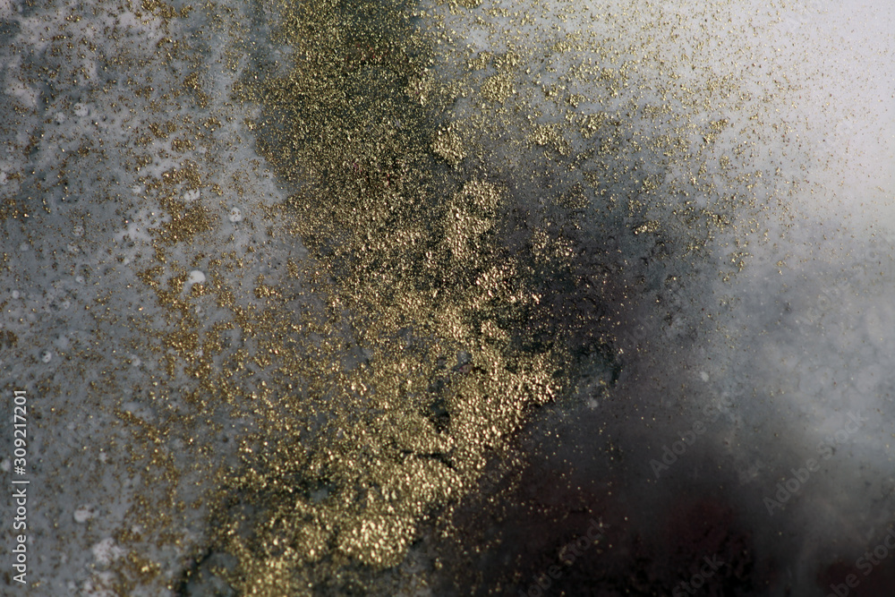 Blur Abstract black and gold paint blots background. Marble texture. Blur Abstract black and gold paint blots background. Marble texture.