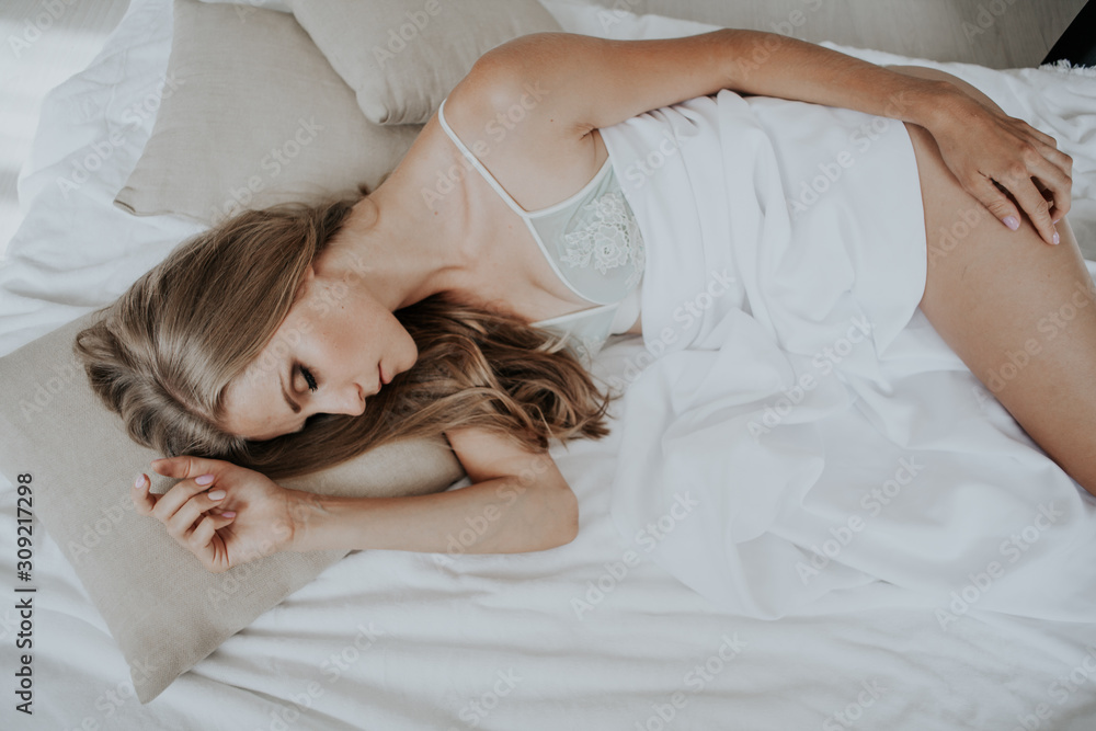 blonde girl asleep in the bedroom dreams holiday morning blonde girl asleep in the bedroom dreams holiday morning