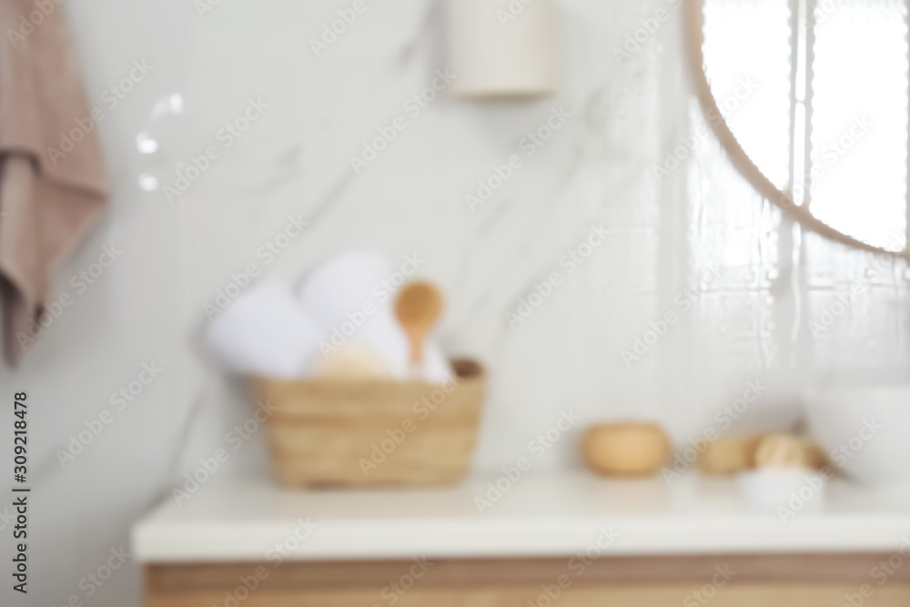 Blurred view of stylish modern bathroom with mirror Blurred view of stylish modern bathroom with mirror