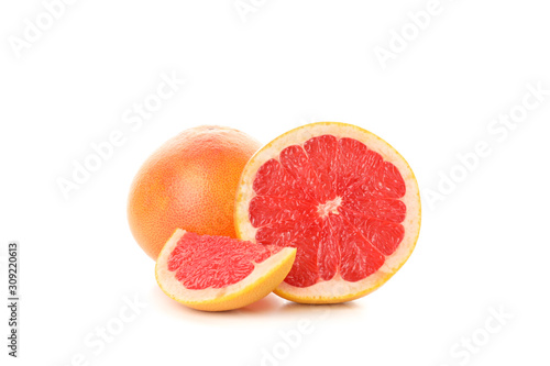 Fresh grapefruits isolated on white background, close up