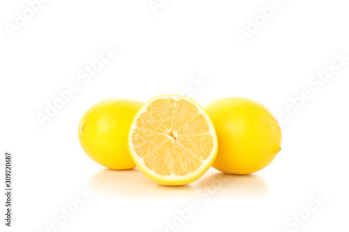 Fresh lemons isolated on white background, close up