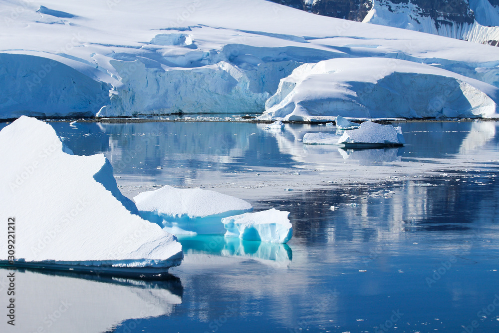 An iceberg in the waters around the Antarctic Peninsula, Palmer Archipelago, Antarctica