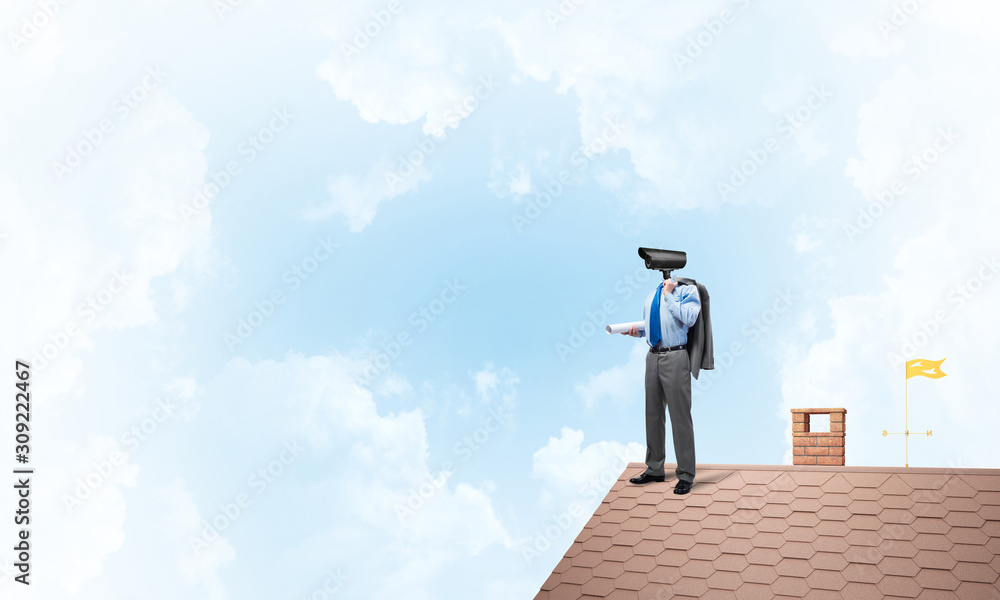Concept of home security and privacy protection with camera headed man Concept of home security and privacy protection with camera headed man