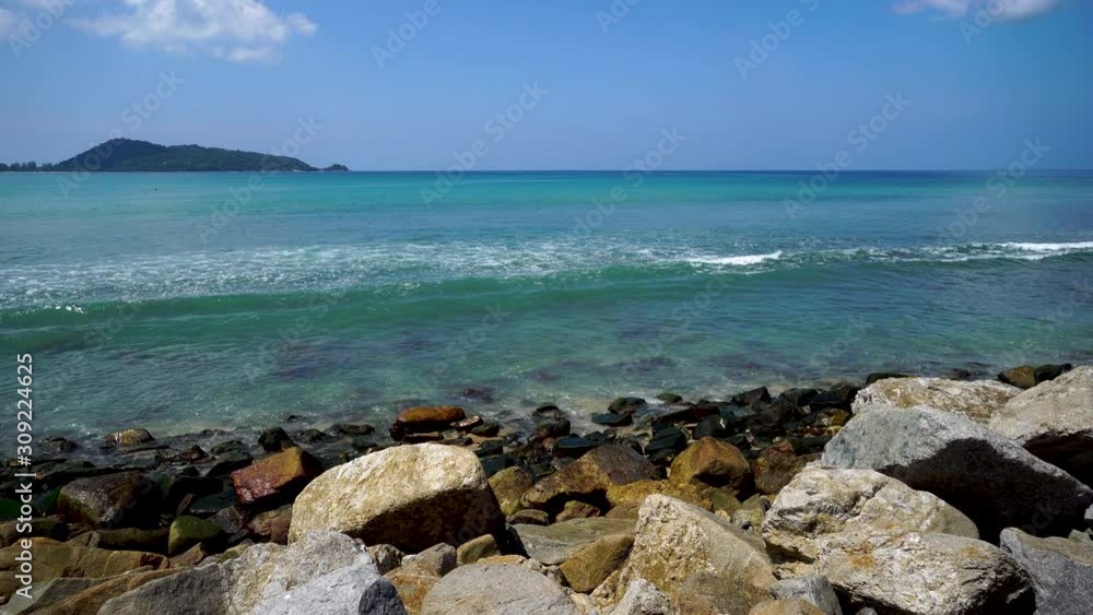 Beautiful tropical beach with blue sky and white cloud background. Summer vacation and nature environment concept. Beautiful tropical beach with blue sky and white cloud background. Summer vacation and nature environment concept.
