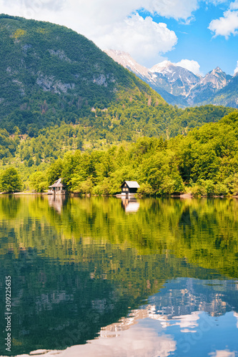 Fototapeta Naklejka Na Ścianę i Meble -  Scenery of wooden houses at Bohinj Lake in Slovenia