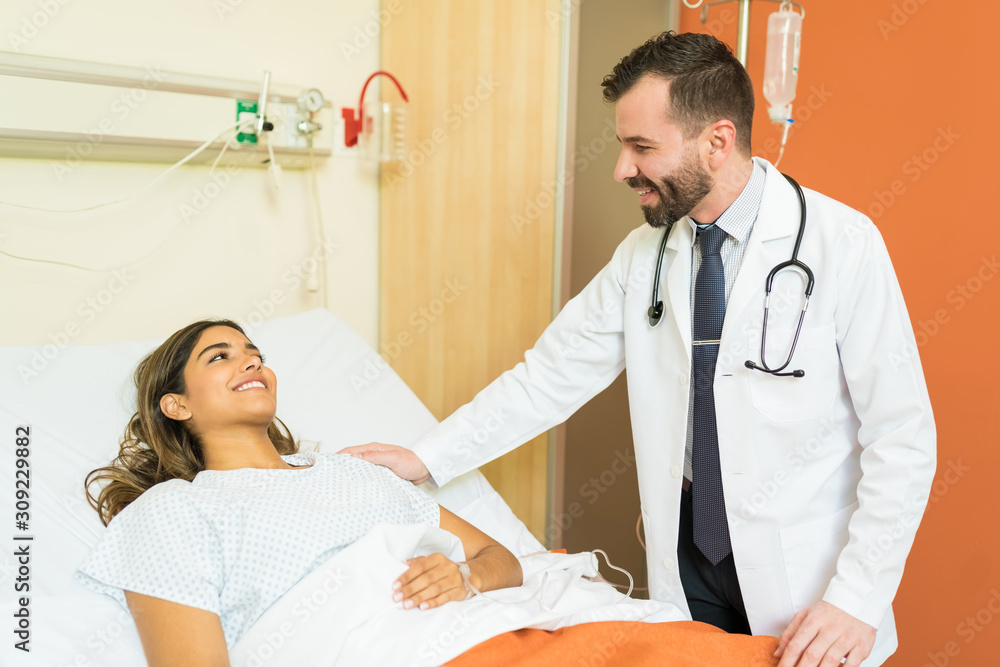 Obraz premium Doctor Comforting Patient At Hospital