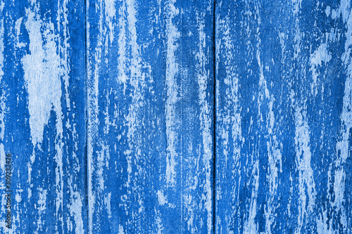 Wooden wall, old plank dirty blue background, texture