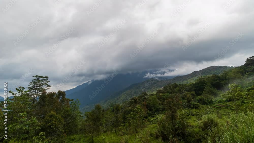 Amazing Beautiful timelapse of moving cloud over Mount Kinabalu in Kundasang, Sabah, Malaysia in 4K resolution Amazing Beautiful timelapse of moving cloud over Mount Kinabalu in Kundasang, Sabah, Malaysia in 4K resolution