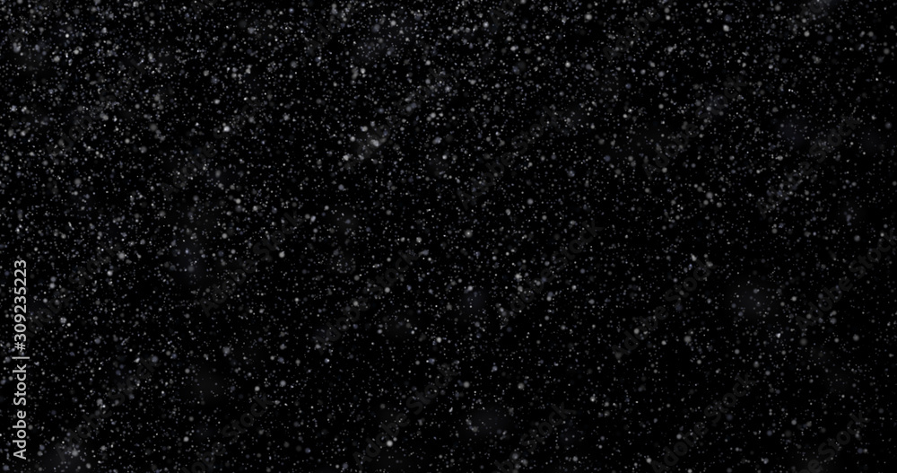 Natural white winter snowfall on a black background Natural white winter snowfall on a black background