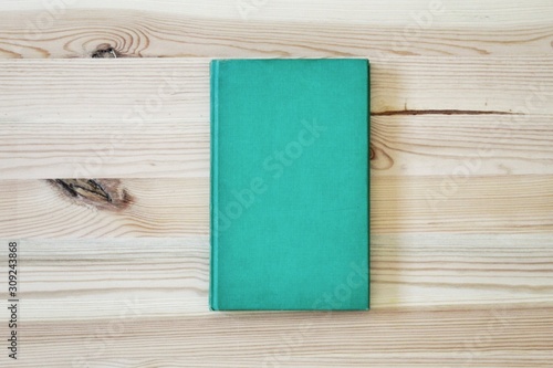 book on wooden background
