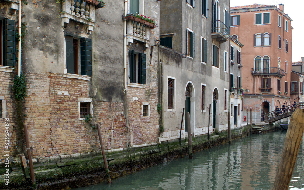 The Springtime. Venice. Old buildings and bridge on street