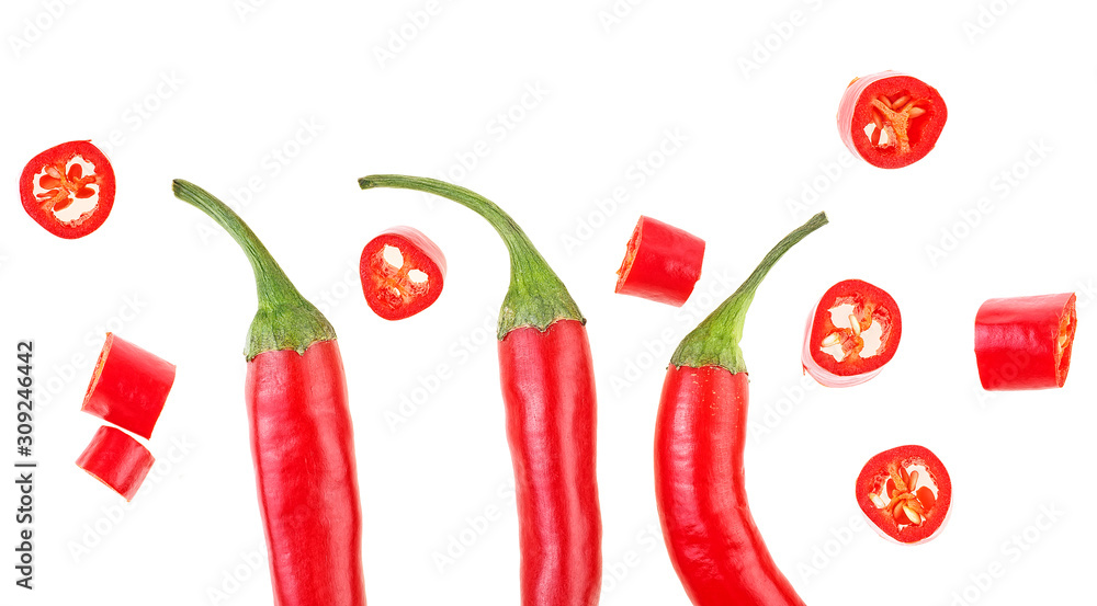 Top view of red chili peppers with slices on a white background Top view of red chili peppers with slices on a white background
