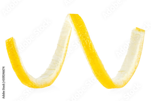 Spiral of lemon skin on isolated white background. Citrus twist peel.