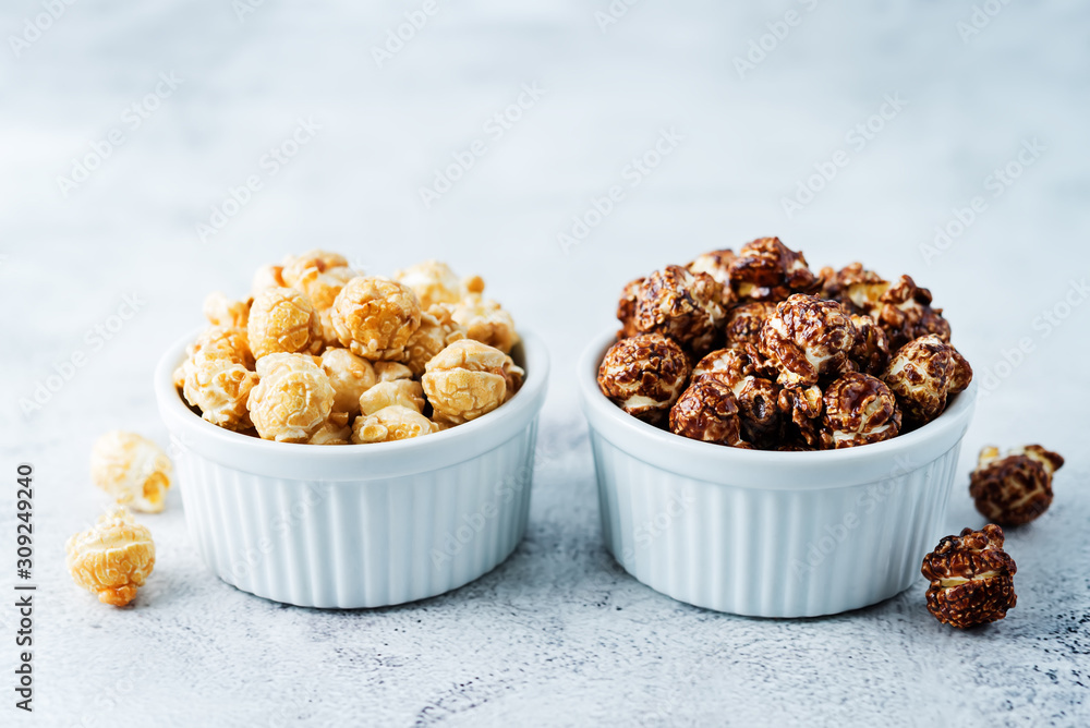 Caramel and chocolate sweet Popcorn in a white bowl Caramel and chocolate sweet Popcorn in a white bowl