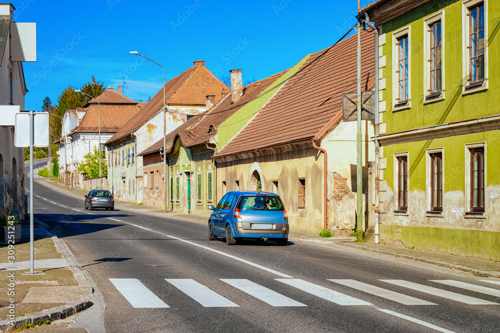 Car on road with crossroads in Slovenska Bistrica