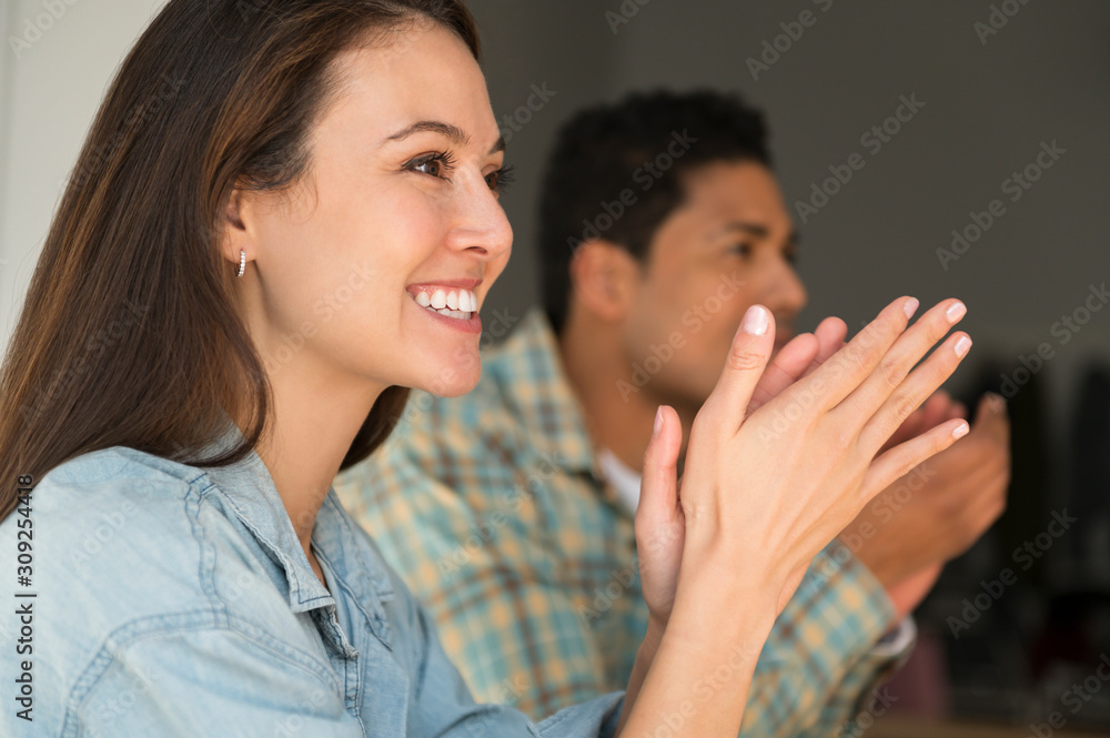Business people applauding during meeting Business people applauding during meeting