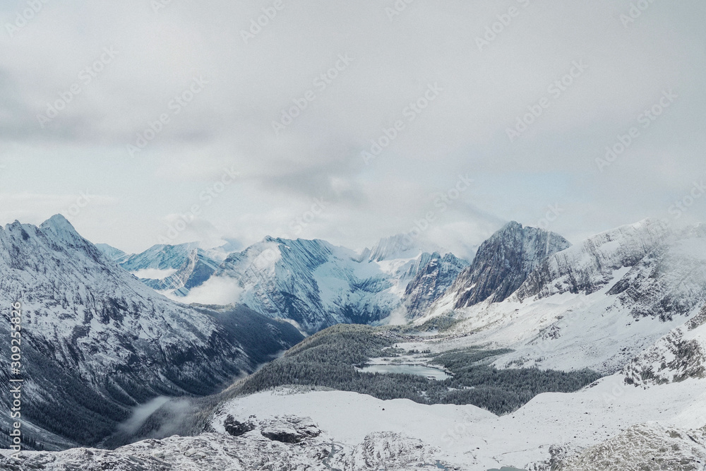 Snow White Glacier Mountains with Brilliant Blue Sky