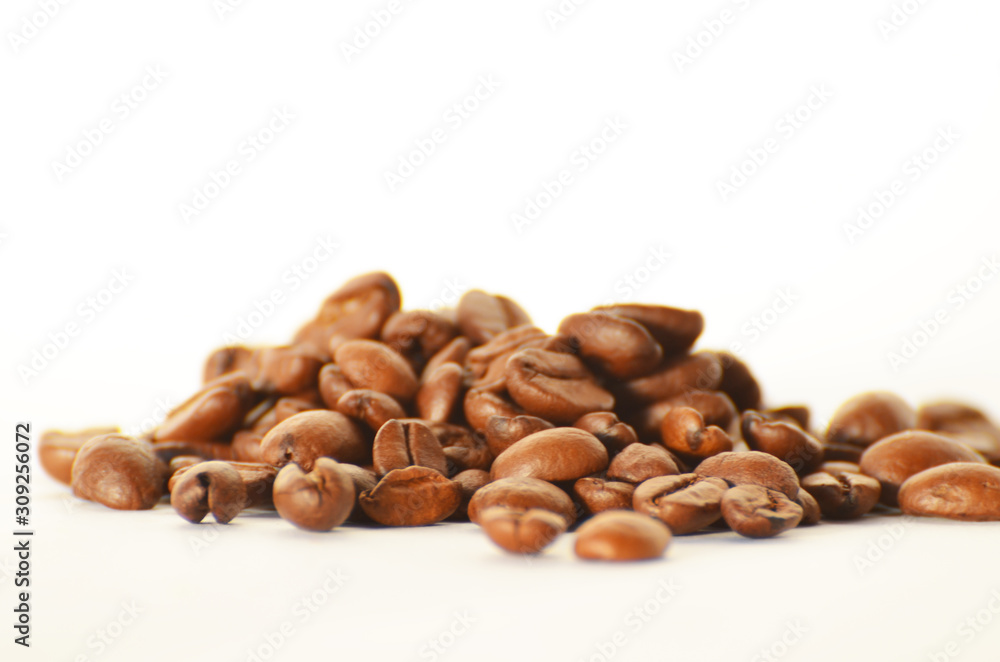 Close-up coffee beans isolated on white,photo Close-up coffee beans isolated on white,photo