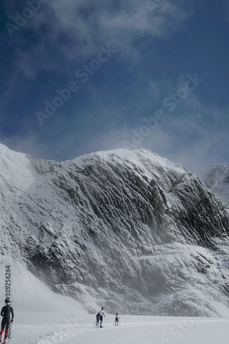 Snow White Glacier Mountains with Brilliant Blue Sky © Jon