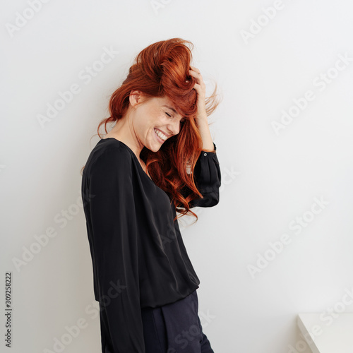Photo Fun young woman with tousled red hair