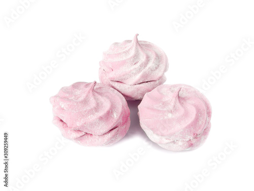 Three pink marshmallows isolated on white background. © leo_nik