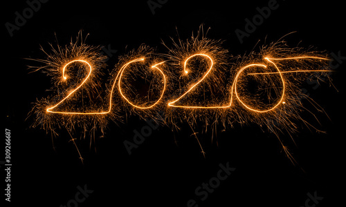 New year 2020 lightpainting golden lettering with sparkler