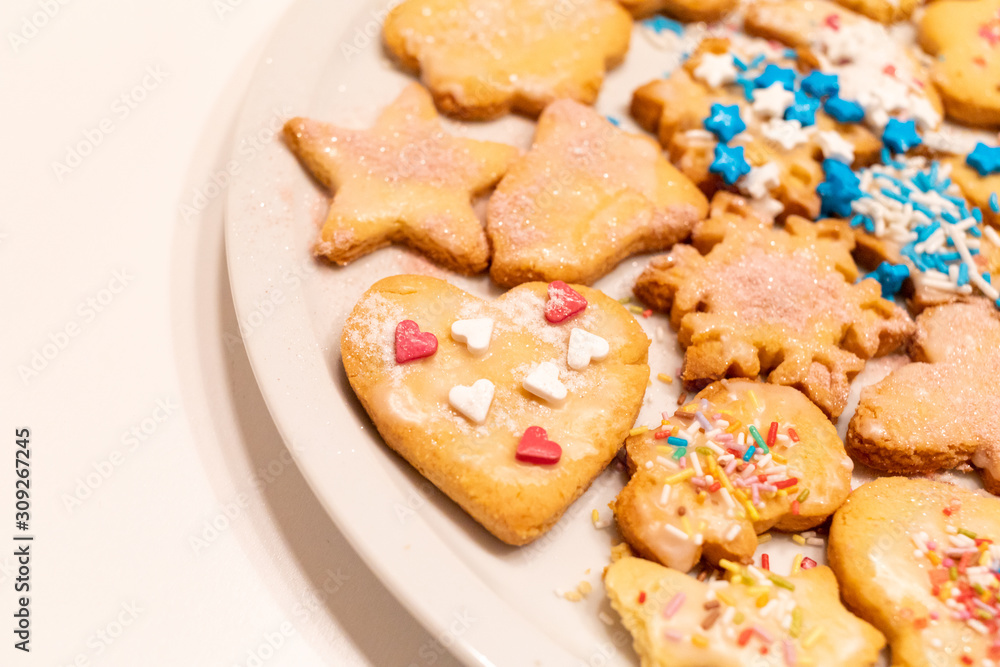 Plate with homemade decorated cookies