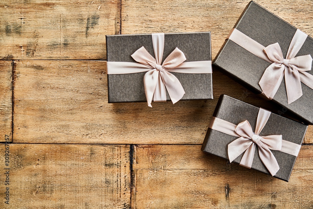 Top view photo of gift box on wooden table. Copy space. Top view photo of gift box on wooden table. Copy space.