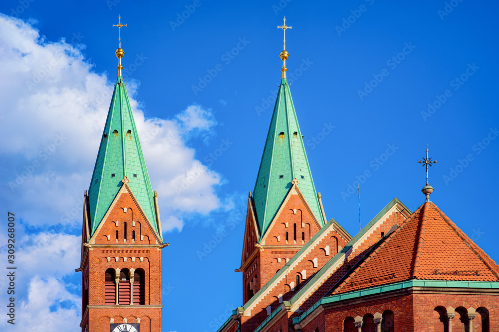 Green towers of Franciscan Church in Old city in Maribor Green towers of Franciscan Church in Old city in Maribor