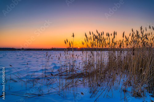 winter sunset over the lake © Valdemaras Mockus