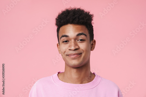 Slika na platnu Portrait of a smiling african teenager boy wearing pullower