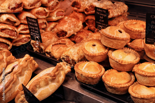 Selection of savoury pastries and pies in a butchers shop